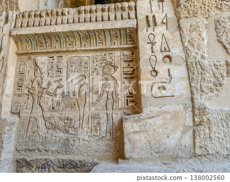 Beautiful bas-reliefs and ancient hieroglyphs from the mortuary temple of Ramesses III at Medinet Habu, Luxor, Egypt. Beautiful bas-reliefs and ancient hieroglyphs from the mortuary temple of Ramesses III at Medinet Habu, Luxor, Egypt. 138002560