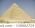 he Great Pyramid of Khufu at Giza Plateau under Hazy Desert Sky, Ancient Wonder 138002729