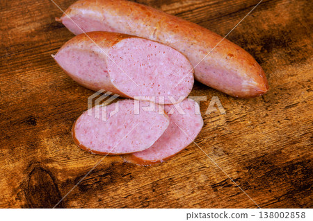 Sausage is cut into slices placed on wooden board ready for eat Sausage is cut into slices placed on wooden board ready for eat 138002858