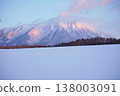 Mount Iwate stands tall in the snow-covered plains. 138003091