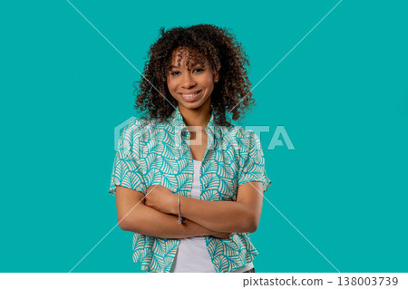 Stylish High school girl, natural real beauty. Young lady looking at camera with smile. Heathy skin and teeth. Biracial woman with african curly hair, gen Z authentic female model. Stylish High school girl, natural real beauty. Young lady looking at camera with smile. Heathy skin and teeth. Biracial woman with african curly hair, gen Z authentic female model. 138003739
