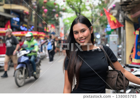 Young Asian Thai Woman in Hanoi Old Quarter Street Scene 138003785