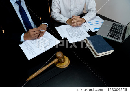 Lawyers are advising clients on litigation matters Lawyers are advising clients on litigation matters 138004256