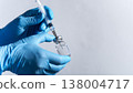 Medical Professional Preparing Syringe with Vial closep with copy space  138004717