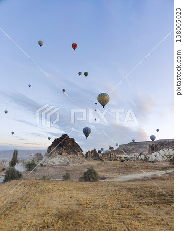 beautiful scenery flight of balloons in the mountains of Cappadocia in love valley beautiful scenery flight of balloons in the mountains of Cappadocia in love valley 138005023