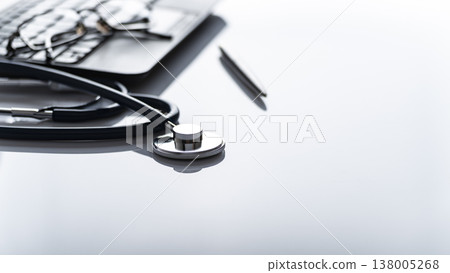 Healthcare background of stethoscope laptop glasses and pen on table with copy-space 138005268