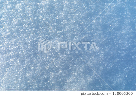 Abstract snow texture illuminated by the sun, top view Abstract snow texture illuminated by the sun, top view 138005300