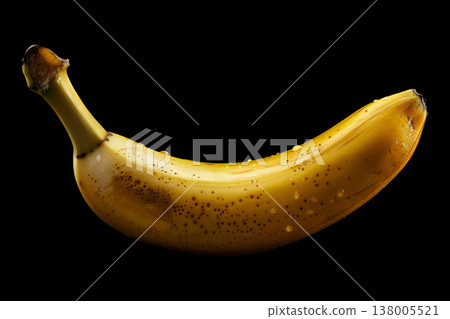 Single ripe banana with droplets isolated on black background with clipping path, concept of freshness and healthy nutrition Single ripe banana with droplets isolated on black background with clipping path, concept of freshness and healthy nutrition 138005521