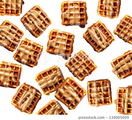 Golden brown square waffles drizzled with caramel sauce, in flat lay style isolated on white background, concept of sweet food Golden brown square waffles drizzled with caramel sauce, in flat lay style isolated on white background, concept of sweet food 138005609