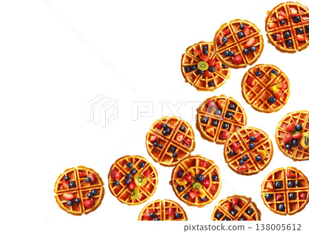 Top view of waffles with mixed fruits isolated on white background, conveying a bright breakfast concept Top view of waffles with mixed fruits isolated on white background, conveying a bright breakfast concept 138005612