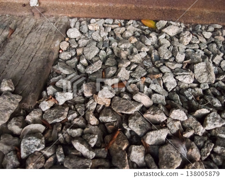 Extreme close-up view of the rocks on the old railway. Different shape of rocks on the railway. Full of rocks. Rock/stone background. 138005879