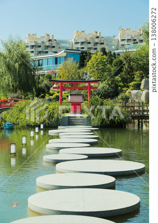 Serene Outdoor Retreat With Lanterns. Tranquil Pond Pathway Leading To Shrine And Reflection 138006272