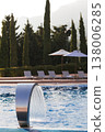 Serene Poolside Relaxation Setting. Idyllic Spa Environment With Scenic Views And Tranquil Ambiance 138006285