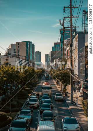 Bangkok city road traffic in timelapse with cars moving through urban street scene, Thailand street with vehicles driving in dynamic time-lapse view, 4k vertical video 138006547