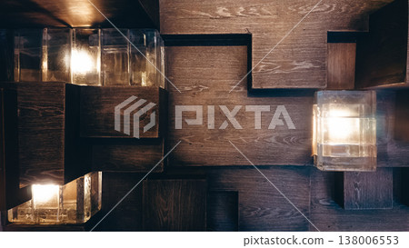 Wooden cube blocks forming stairs pattern with light and texture abstract background, Geometric wood surface lluminated, modern design composition backdrop Wooden cube blocks forming stairs pattern with light and texture abstract background, Geometric wood surface lluminated, modern design composition backdrop 138006553