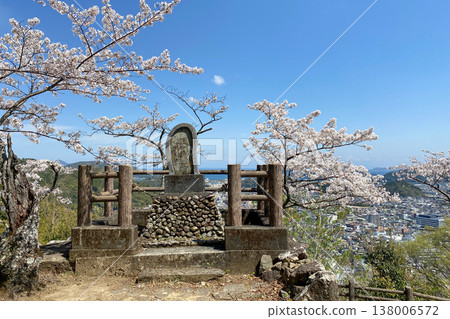 Doppo Monument and cherry blossoms at the ruins of Saiki Castle overlooking Saiki city Doppo Monument and cherry blossoms at the ruins of Saiki Castle overlooking Saiki city 138006572