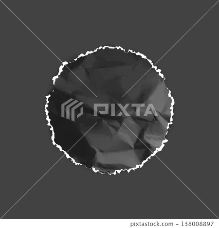 A round piece of black crumpled paper with a jagged white torn edge on a black background. A round piece of black crumpled paper with a jagged white torn edge on a black background. 138008897