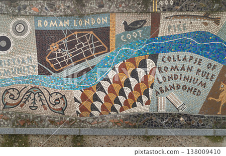 Through a patchwork of architectural precision, a mosaic river flows past the rigid walls of a rising empire. It pulses from the nascent patterns of a Christian community toward the haunting imagery Through a patchwork of architectural precision, a mosaic river flows past the rigid walls of a rising empire. It pulses from the nascent patterns of a Christian community toward the haunting imagery 138009410