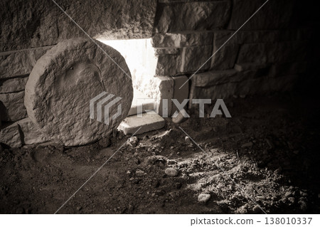 Empty tomb with stone rolled away and light Empty tomb with stone rolled away and light 138010337