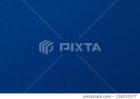 Deep blue textured paper background with copy space for modern design projects Deep blue textured paper background with copy space for modern design projects 138010577