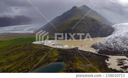 Aerial View of Icelandic Mountain, Glacier, and Glacial Lake Aerial View of Icelandic Mountain, Glacier, and Glacial Lake 138010711