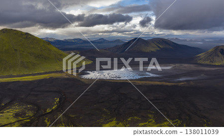 Aerial View of Iceland's Volcanic Landscape with Shallow Lake Aerial View of Iceland's Volcanic Landscape with Shallow Lake 138011039