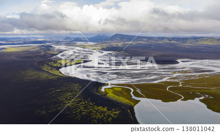 Aerial View of Braided River and Volcanic Landscape in Iceland Aerial View of Braided River and Volcanic Landscape in Iceland 138011042