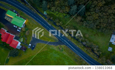 Aerial View of Rural Iceland with Road, Buildings, and Stream Aerial View of Rural Iceland with Road, Buildings, and Stream 138011068
