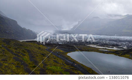 Aerial View of Icelandic Glacier with Lake and Volcanic Terrain Aerial View of Icelandic Glacier with Lake and Volcanic Terrain 138011076