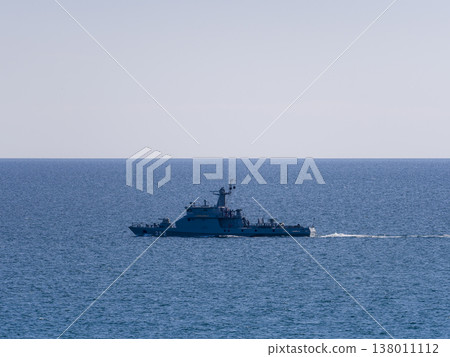 Warships (missile gunboats) sailing the sea 138011112