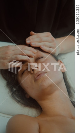 Gentle sinus stimulation during peaceful face treatment session Gentle sinus stimulation during peaceful face treatment session 138011335