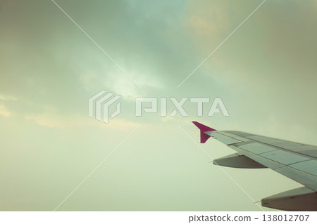 View from plane window, cloud sky 138012707