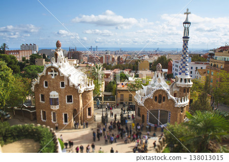 Entrance pavilions of Park Guell and Barcelona city view Entrance pavilions of Park Guell and Barcelona city view 138013015