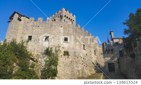 The formidable stone walls and defensive battlements of the Guaita Tower in San Marino 138013324