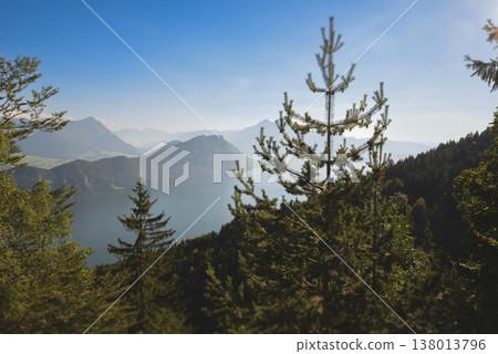 Scenic view of Lake Lucerne and Swiss Alps under bright sunlight Scenic view of Lake Lucerne and Swiss Alps under bright sunlight 138013796