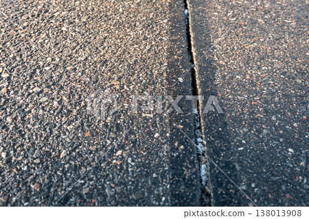 Asphalt Road Surface Expansion Joint Detail Showing Pavement Separation 138013908