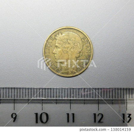 A 50-cent coin issued in France in 1937. 138014159