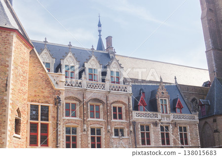 Intricate Gothic architecture and ornate dormer windows of the Gruuthusemuseum in Bruges, Belgium 138015683