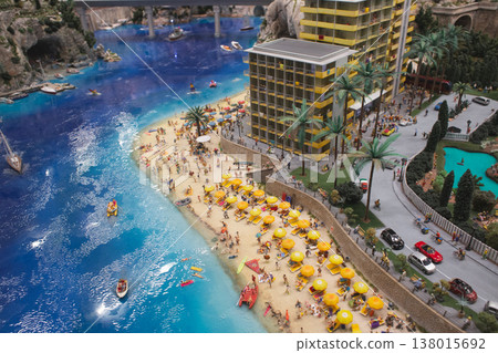 Aerial view of a miniature luxury beach resort with vibrant seaside life Aerial view of a miniature luxury beach resort with vibrant seaside life 138015692