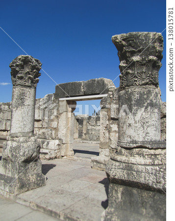 Ancient limestone columns and ruins of the Capernaum Synagogue Ancient limestone columns and ruins of the Capernaum Synagogue 138015781