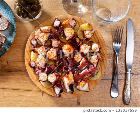 Cooked octopus with potatoes 138017659