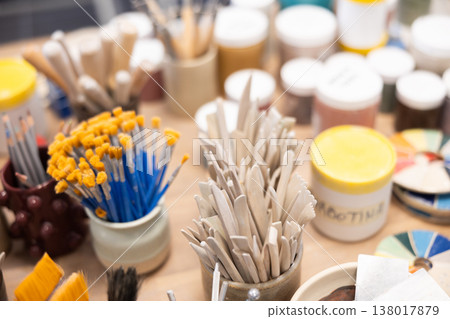Brushes and tools for sculpting in ceramic workshop 138017879