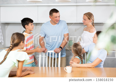 Big family discussing Big family discussing 138018150