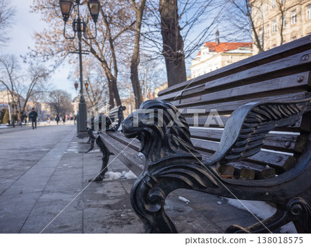 [Ukraine] A bench adorned with a lion sculpture is placed in a park in Lviv, western Ukraine. 138018575