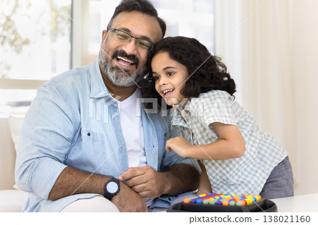 Happy aged Indian man enjoy tender moment with little grandson Happy aged Indian man enjoy tender moment with little grandson 138021160