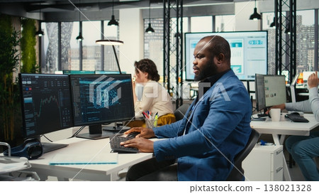 Black engineer uses artificial intelligence systems for automation and data mining, employing neural networks for innovation and digitalization. Multinational company functions with AI. Black engineer uses artificial intelligence systems for automation and data mining, employing neural networks for innovation and digitalization. Multinational company functions with AI. 138021328