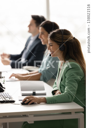 Professional staff of tech support working in call center office Professional staff of tech support working in call center office 138021516