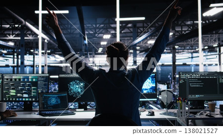 Delighted developer celebrating in data center after successfully coding with generative AI. Overjoyed employee doing high five with colleague after leveraging AI large language model, camera A Delighted developer celebrating in data center after successfully coding with generative AI. Overjoyed employee doing high five with colleague after leveraging AI large language model, camera A 138021527