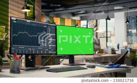 Stock market metrics charts displayed on green screen computer display in investment firm office. Workstation in forex company workspace with live financial data visible on chroma key PC Stock market metrics charts displayed on green screen computer display in investment firm office. Workstation in forex company workspace with live financial data visible on chroma key PC 138021716