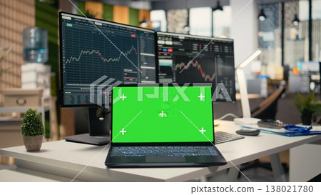 Close up of mockup laptop in forex trading firm office used for stock exchange analysis and strategy planning. Green screen notebook displaying stock market graphs in hedge fund company workplace Close up of mockup laptop in forex trading firm office used for stock exchange analysis and strategy planning. Green screen notebook displaying stock market graphs in hedge fund company workplace 138021780